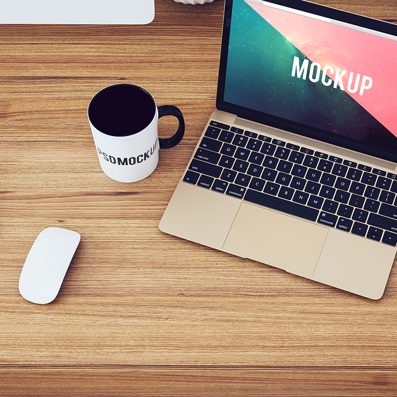 laptop and mug on desk